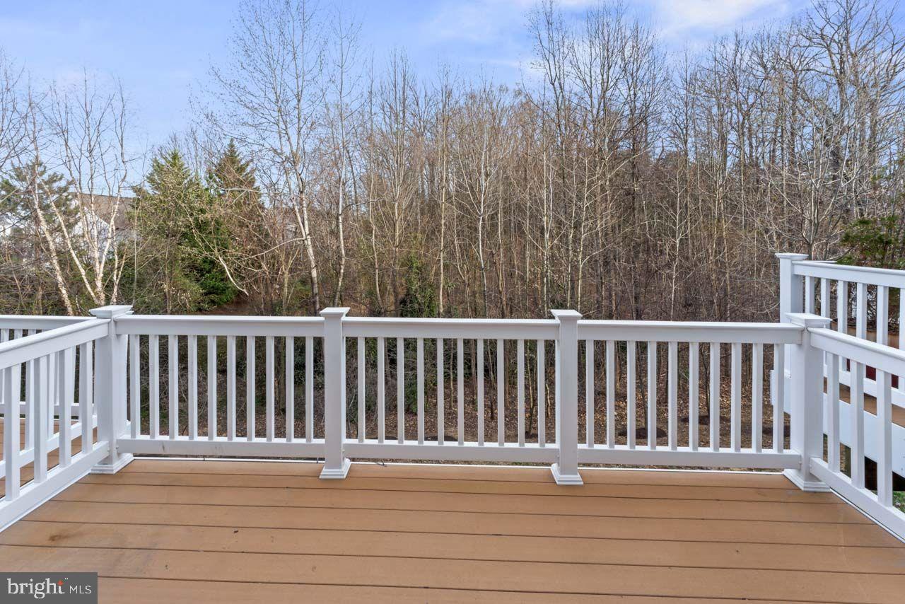 17045 Gibson Road Dumfries, VA 22026 - Photo 22 of 32 Serene deck overlooking tranquil woods.