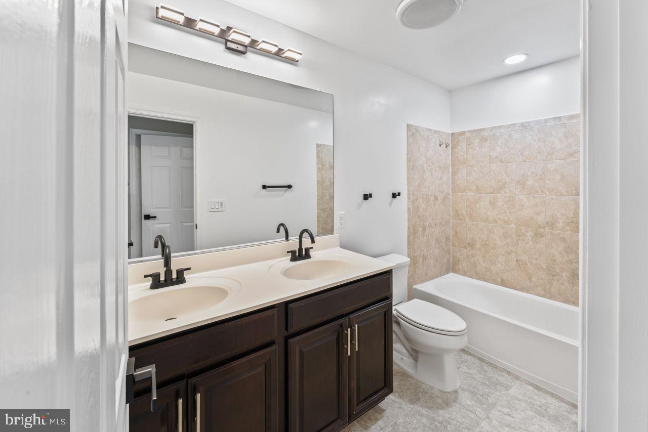 17045 Gibson Road Dumfries, VA 22026 - Photo 30 of 32 Modern bathroom with elegant finishes.