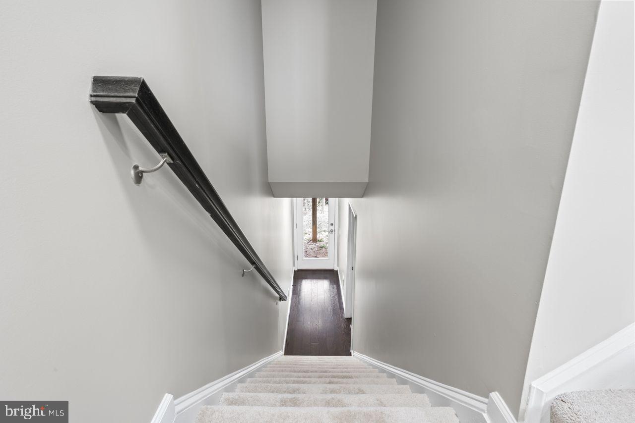 17045 Gibson Road Dumfries, VA 22026 - Photo 6 of 32 Inviting staircase leading to bright entryway.