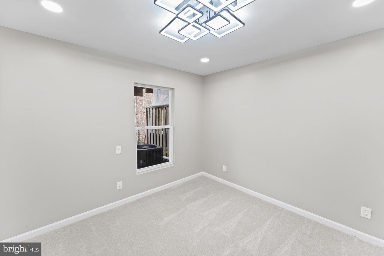 17045 Gibson Road Dumfries, VA 22026 - Photo 7 of 32 Bright, airy space with modern lighting.