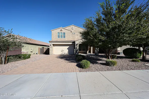 a front view of a house with patio