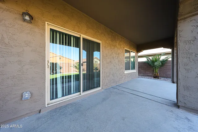 a view of backyard with porch and outdoor space