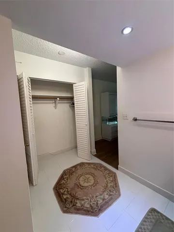 a view of a garden with a palm tree