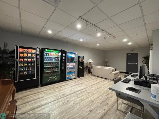 a bed room with a bed and a television