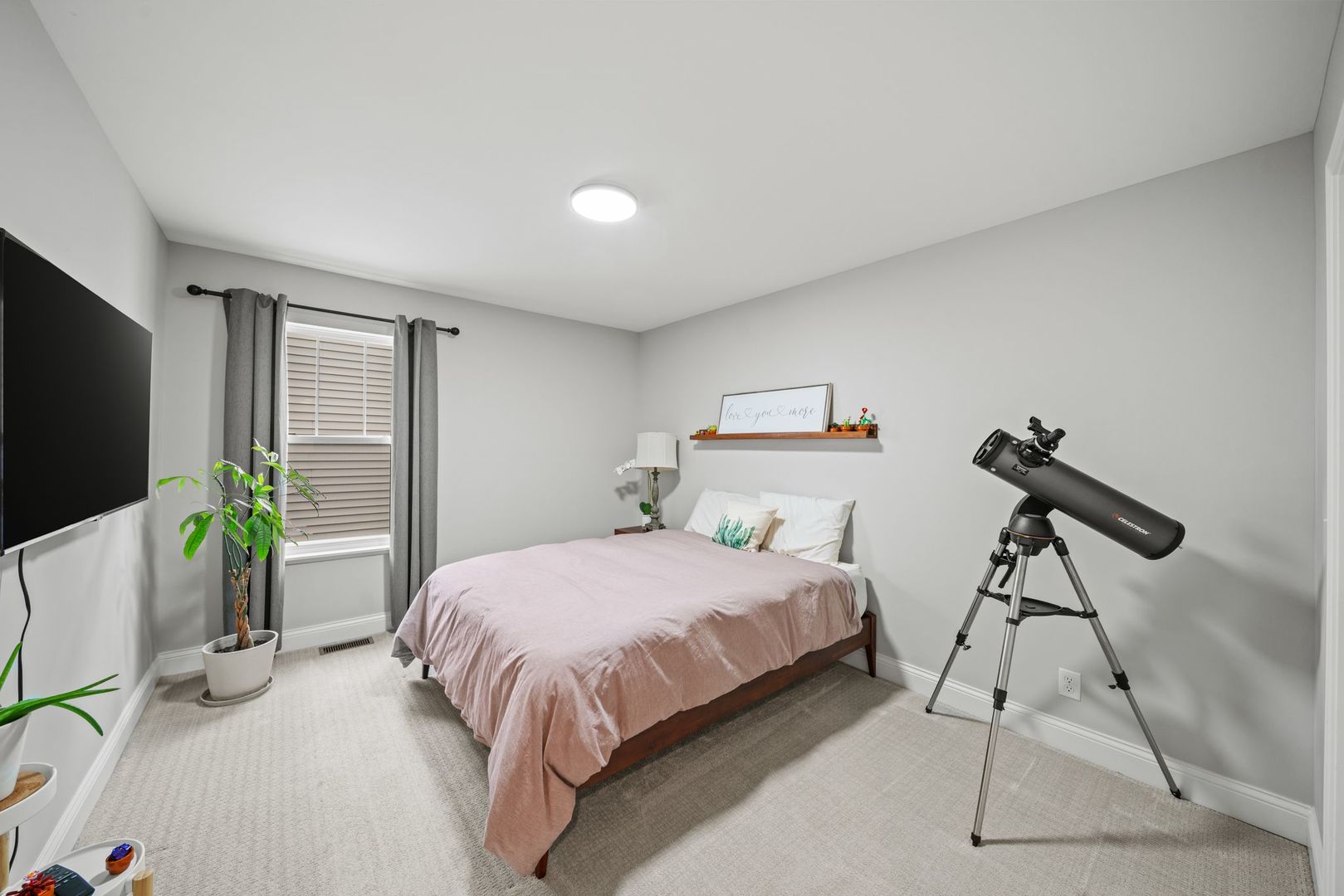 265 South Pointe Avenue South Elgin, IL 60177 - Photo 26 of 43 a bedroom with a bed and a flat screen tv