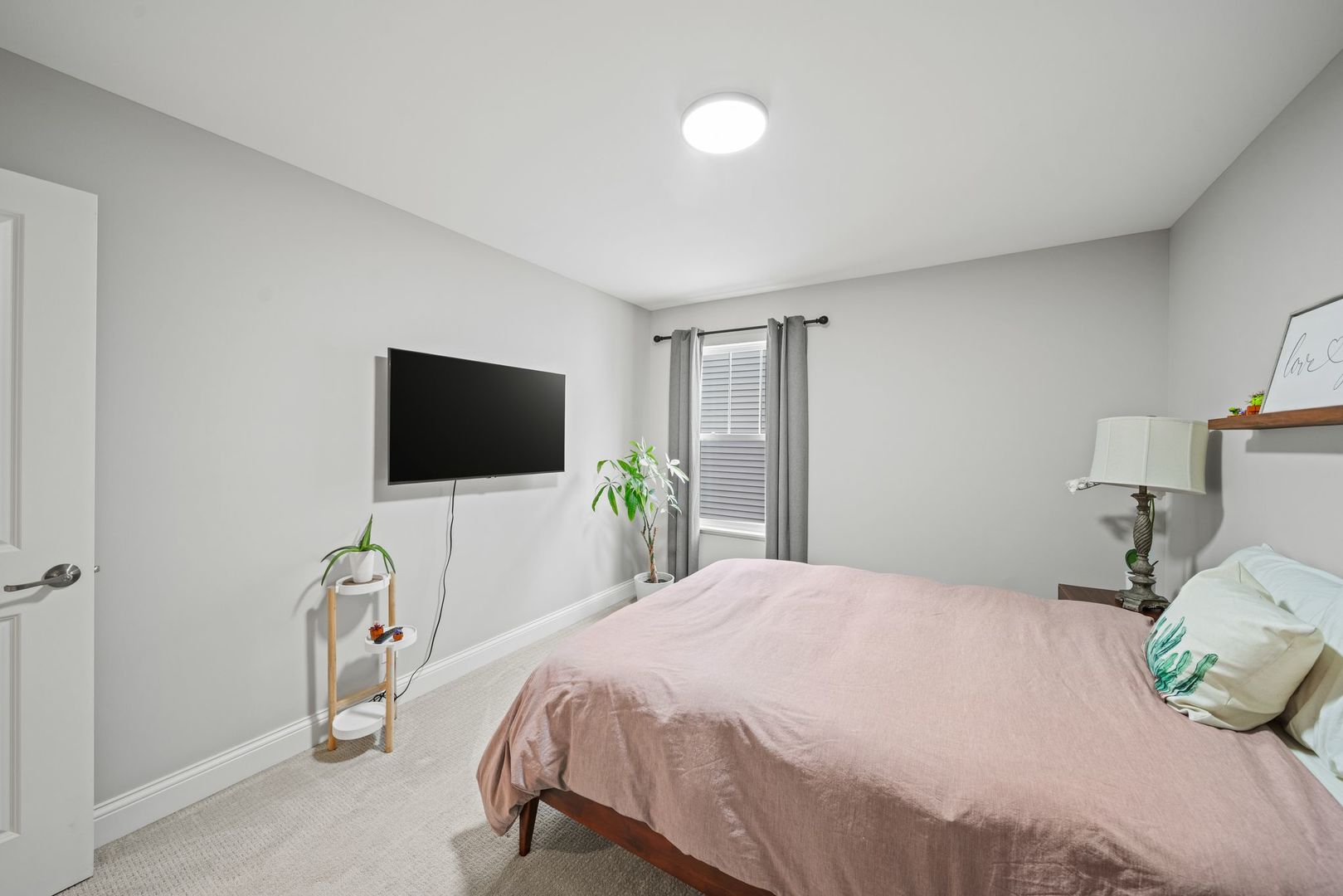 265 South Pointe Avenue South Elgin, IL 60177 - Photo 27 of 43 a bedroom with a bed and a flat screen tv