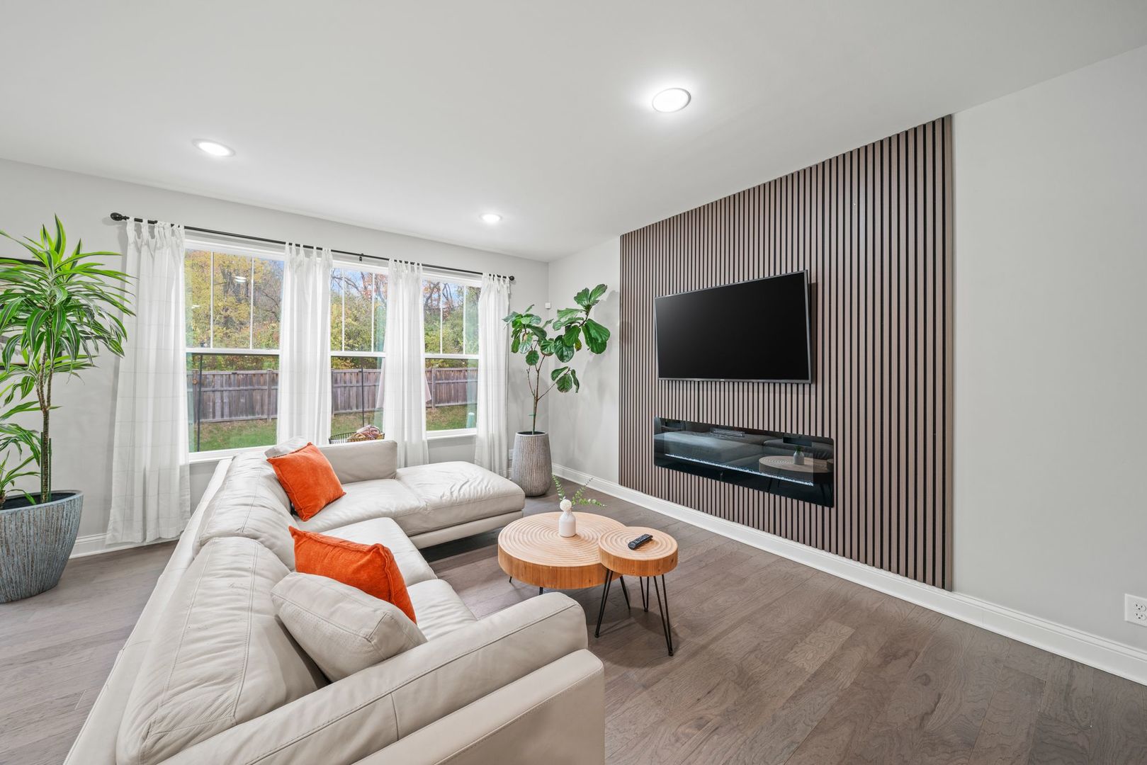 265 South Pointe Avenue South Elgin, IL 60177 - Photo 7 of 43 a living room with furniture and a flat screen tv