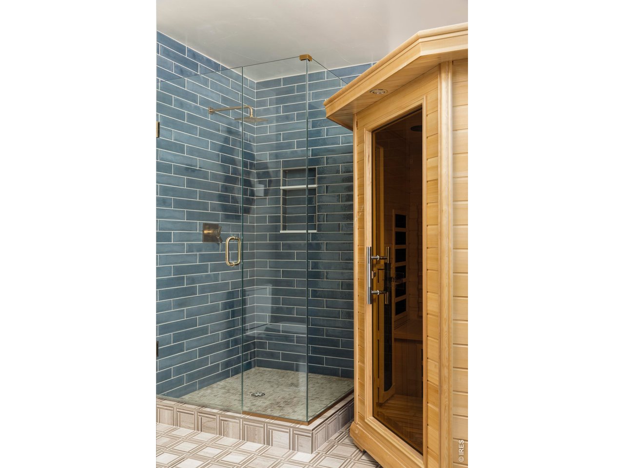 150 Valley View Way Boulder, CO 80304 - Photo 26 of 36 A nearby bathroom with a sauna creates a private wellness retreat, perfect for recovery after a day on the trails or simply unwinding at home.