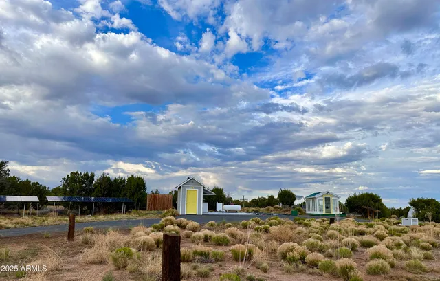 a view of outdoor space and front view of a house