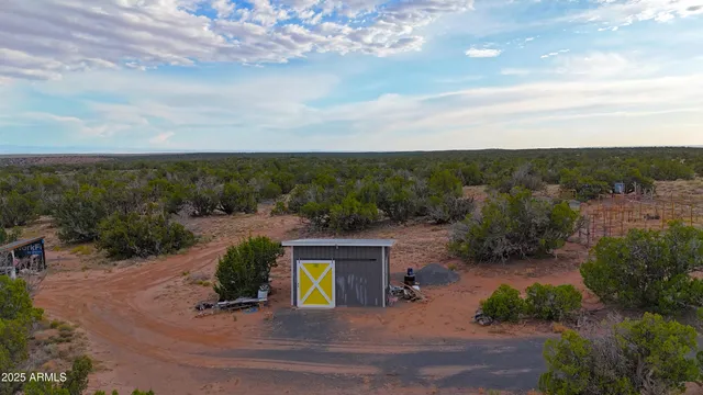 a view of a building with a snow in front of it