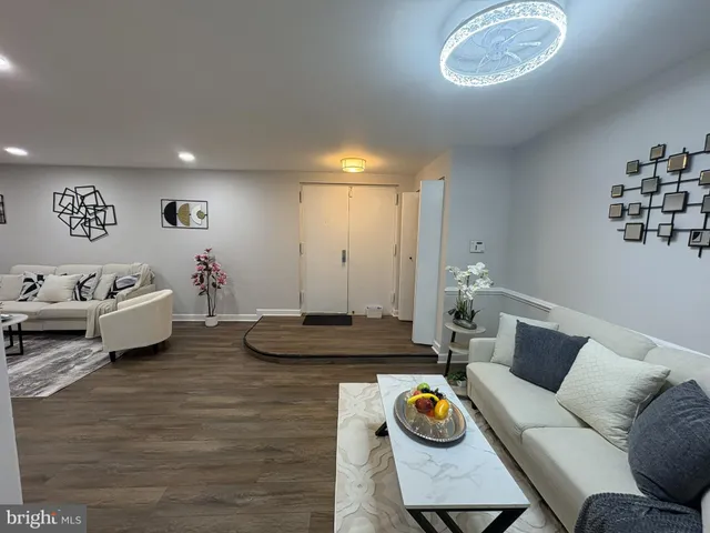 a living room with furniture and rug