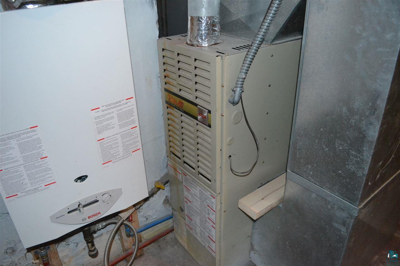 718 4th Street Proctor, MN 55810 - Photo 17 of 24 Furnace and tankless water heater (not hooked up)