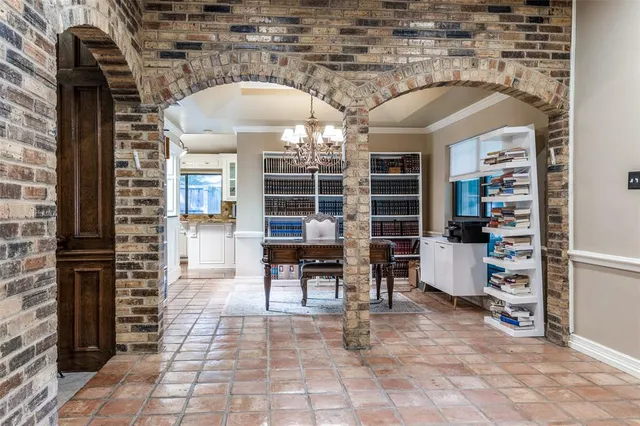 a view of living room kitchen and entryway