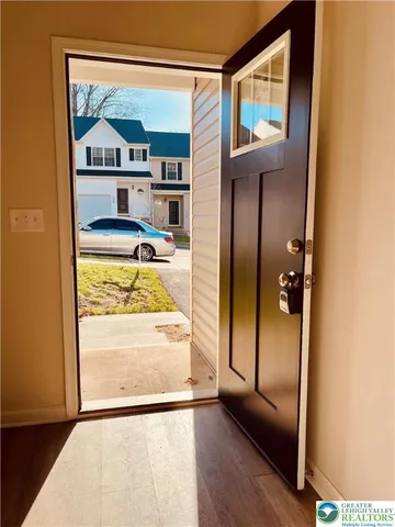 a view of front door with hallway
