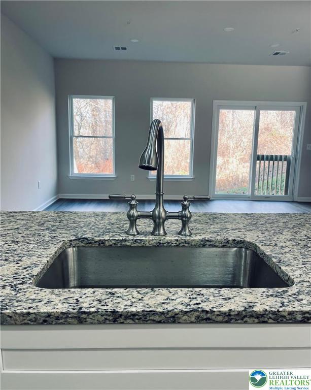 320 Barber Street, Unit LOT 32 Allentown, PA 18103 - Photo 20 of 53 a view closed kitchen island a sink a counter top space and a window