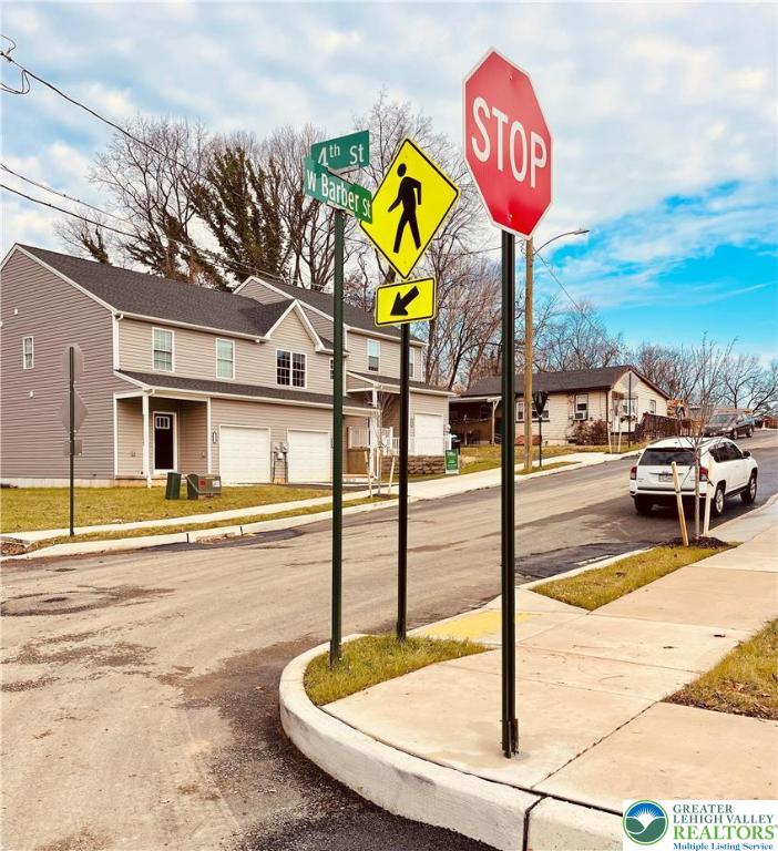 320 Barber Street, Unit LOT 32 Allentown, PA 18103 - Photo 2 of 53 a view of a street with potted plants