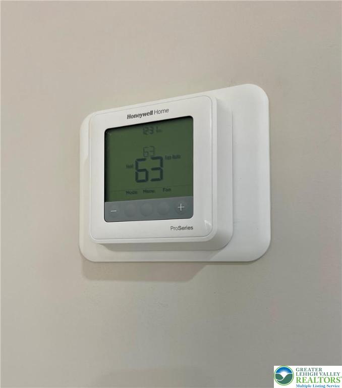 320 Barber Street, Unit LOT 32 Allentown, PA 18103 - Photo 51 of 53 a close up of a wall with a mirror