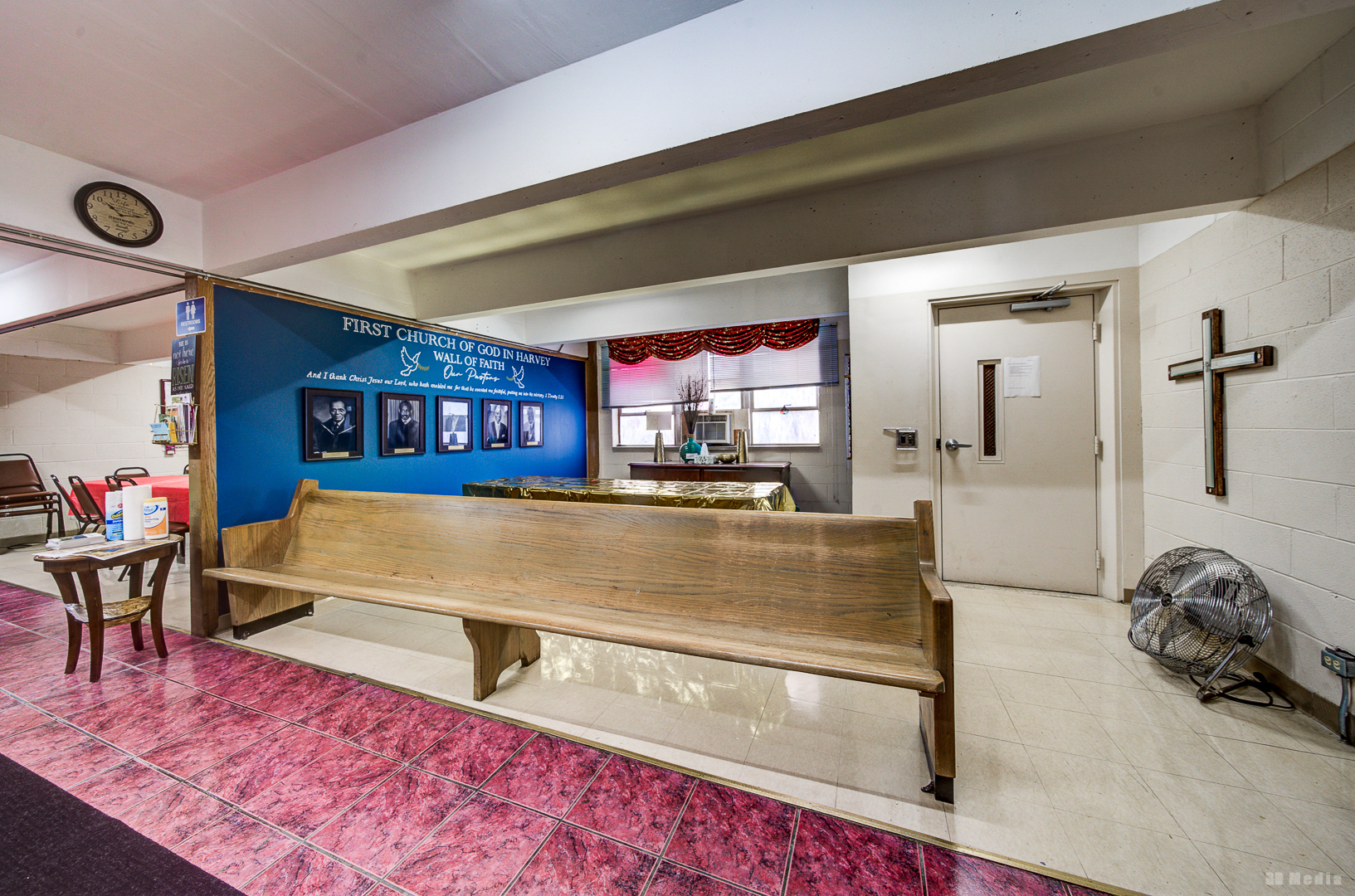 14701 Myrtle Avenue Harvey, IL 60426 - Photo 16 of 28 a living room with furniture gym equipment and a large window