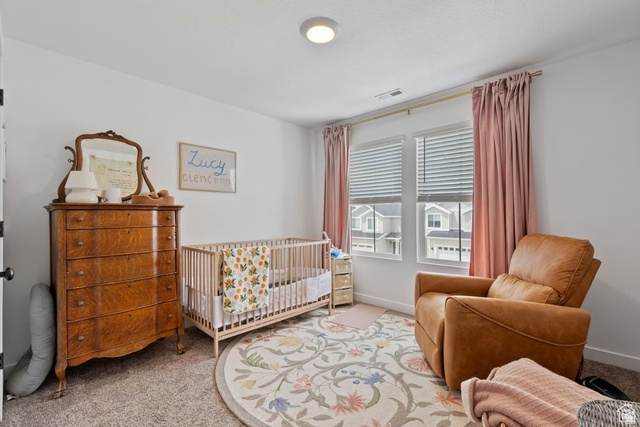 1323 South Raintree Lane Santaquin, UT 84655 - Photo 14 of 23 Bedroom with carpet and a crib
