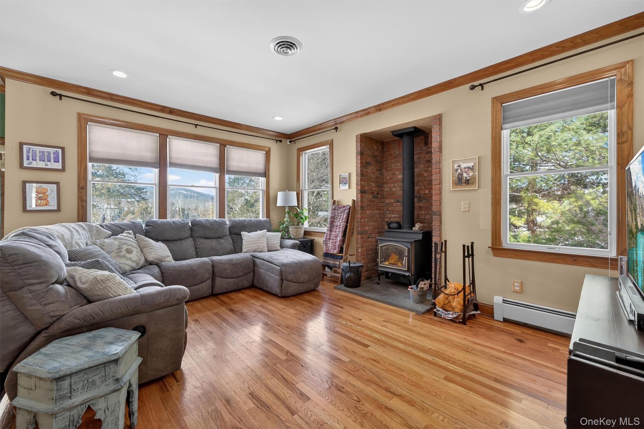 72 Coppergate Lane Warwick, NY 10990 - Photo 2 of 50 a living room with furniture and large windows