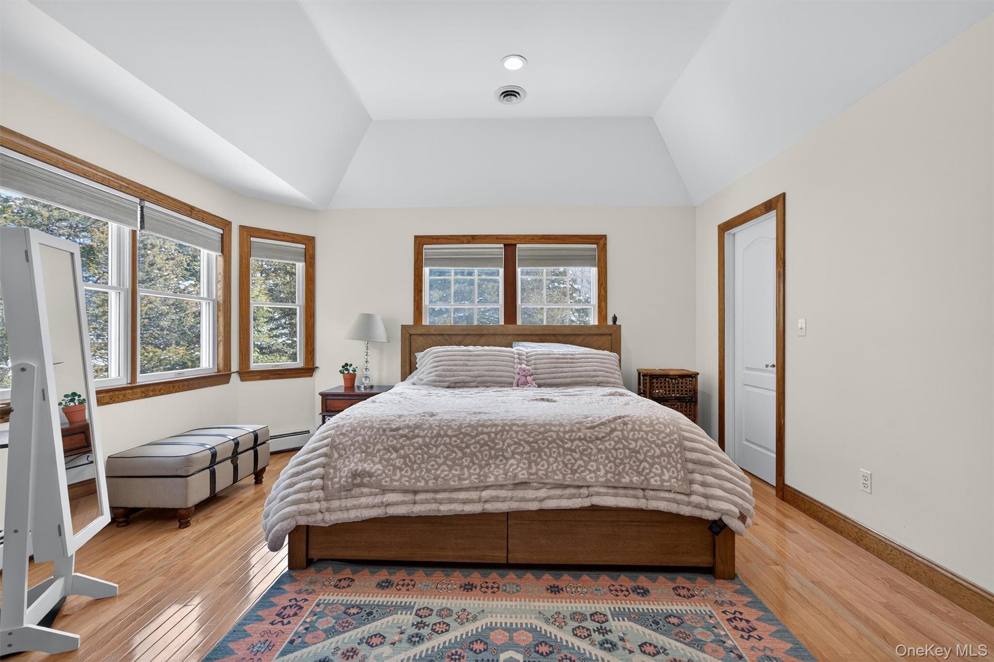 72 Coppergate Lane Warwick, NY 10990 - Photo 22 of 50 a bedroom with a large bed and a couch