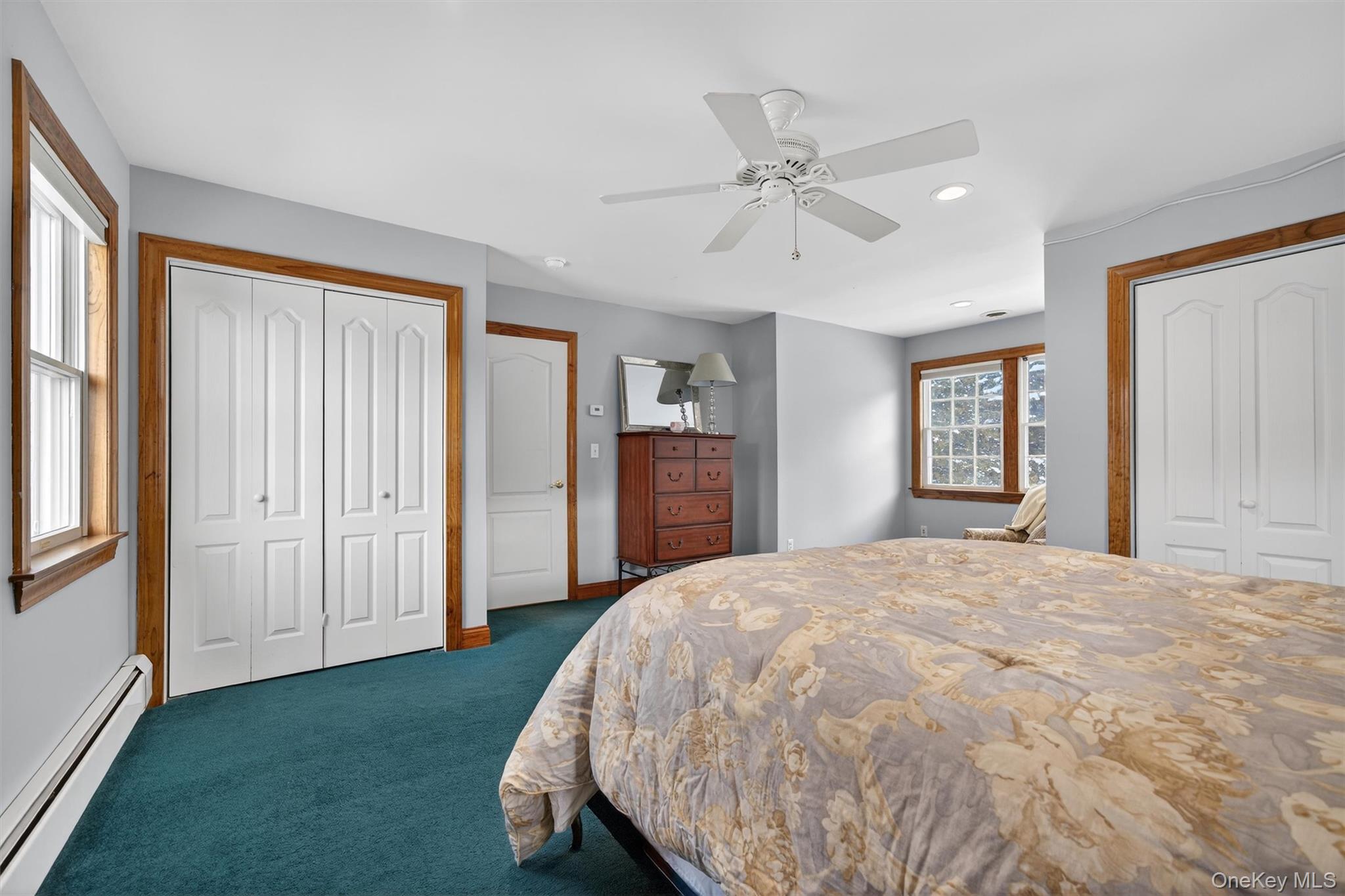 72 Coppergate Lane Warwick, NY 10990 - Photo 28 of 50 a bed sitting in a spacious bedroom next to a window and a dresser