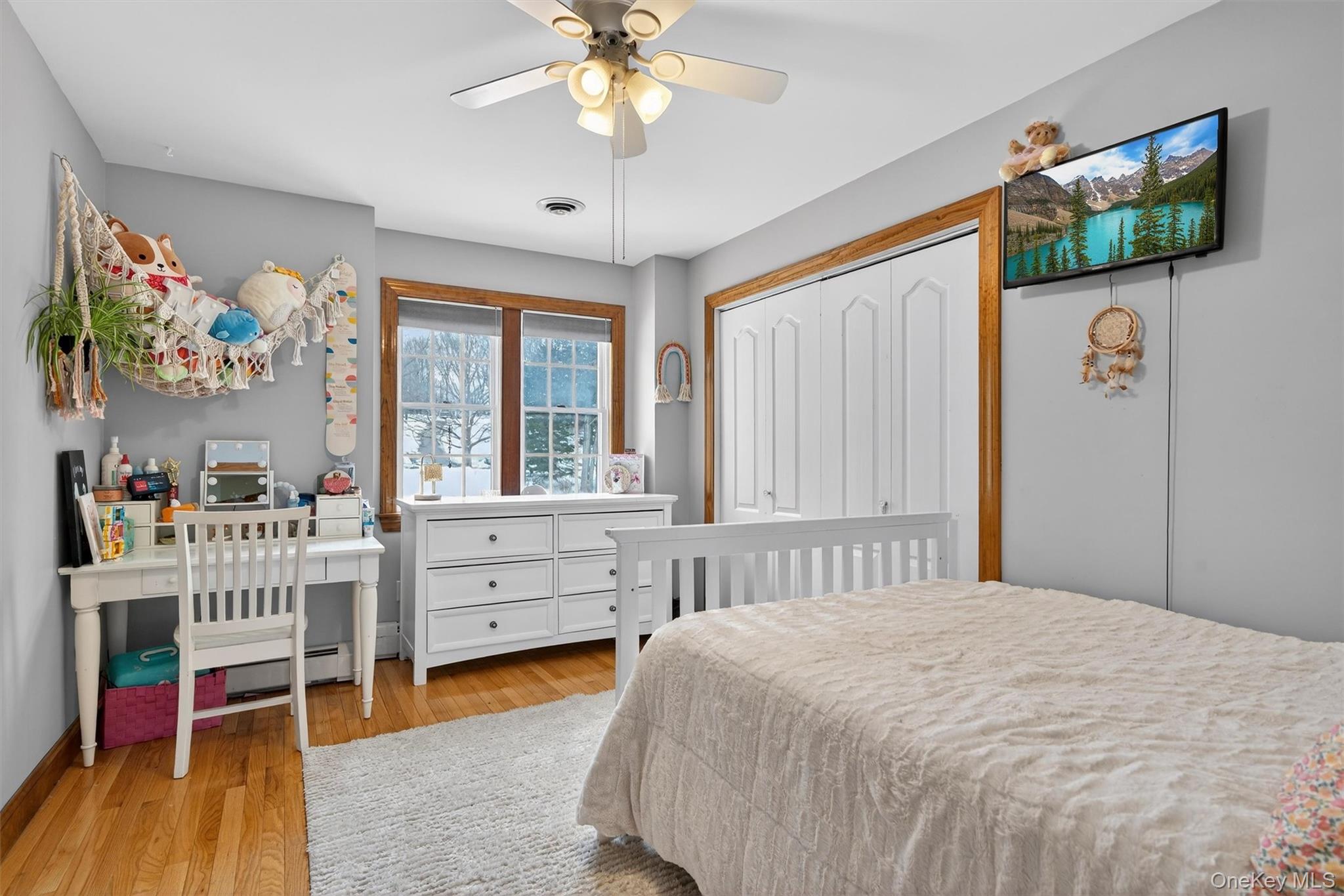 72 Coppergate Lane Warwick, NY 10990 - Photo 29 of 50 a bedroom with a bed and a window