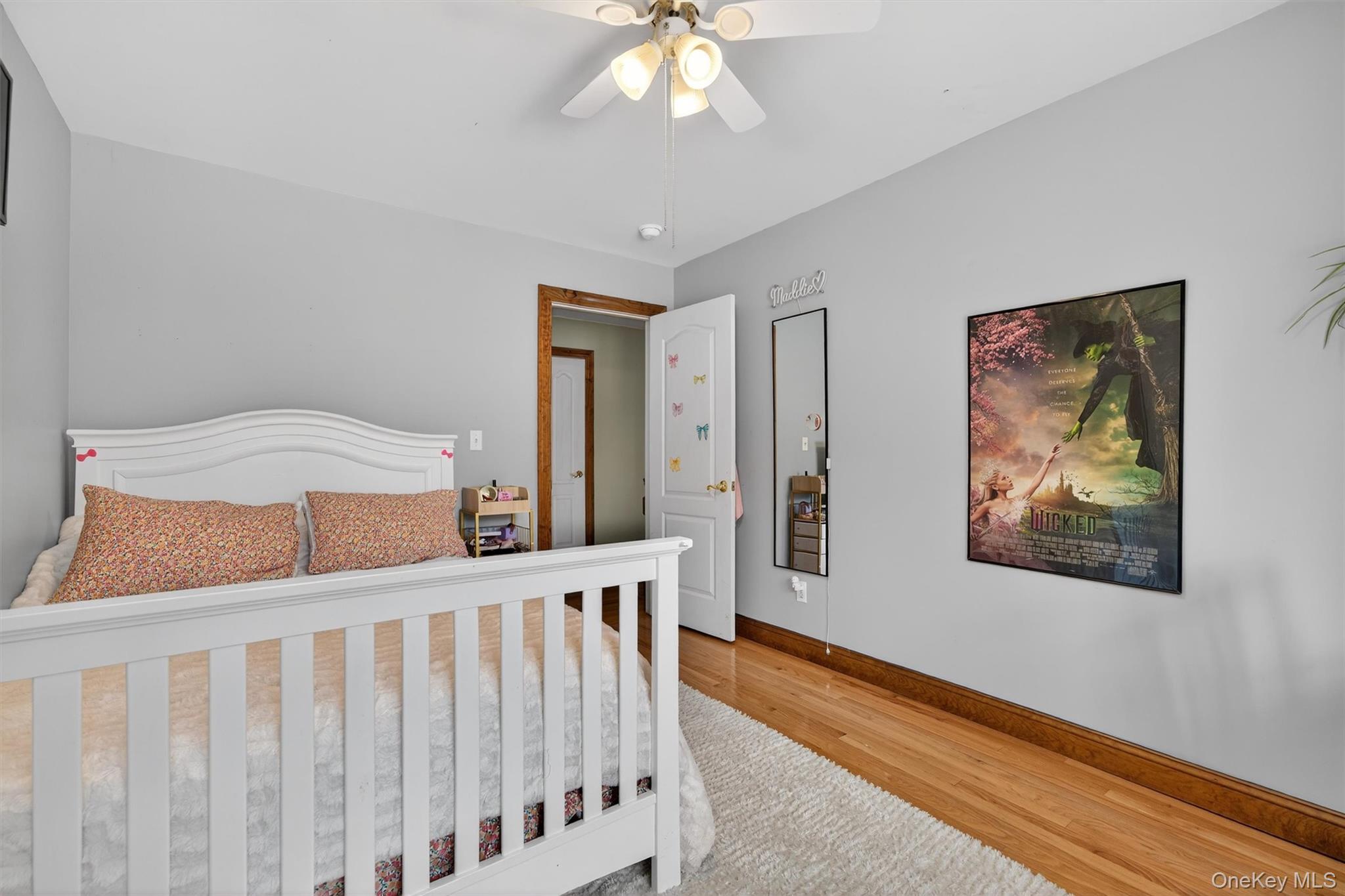 72 Coppergate Lane Warwick, NY 10990 - Photo 30 of 50 a bedroom with a bed and wooden floor