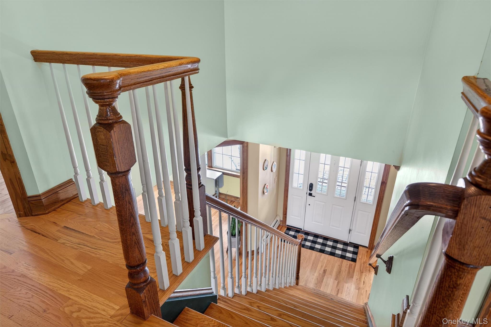 72 Coppergate Lane Warwick, NY 10990 - Photo 37 of 50 a view of an entryway with wooden floor and door