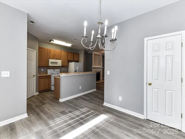 a view of a kitchen and a sink