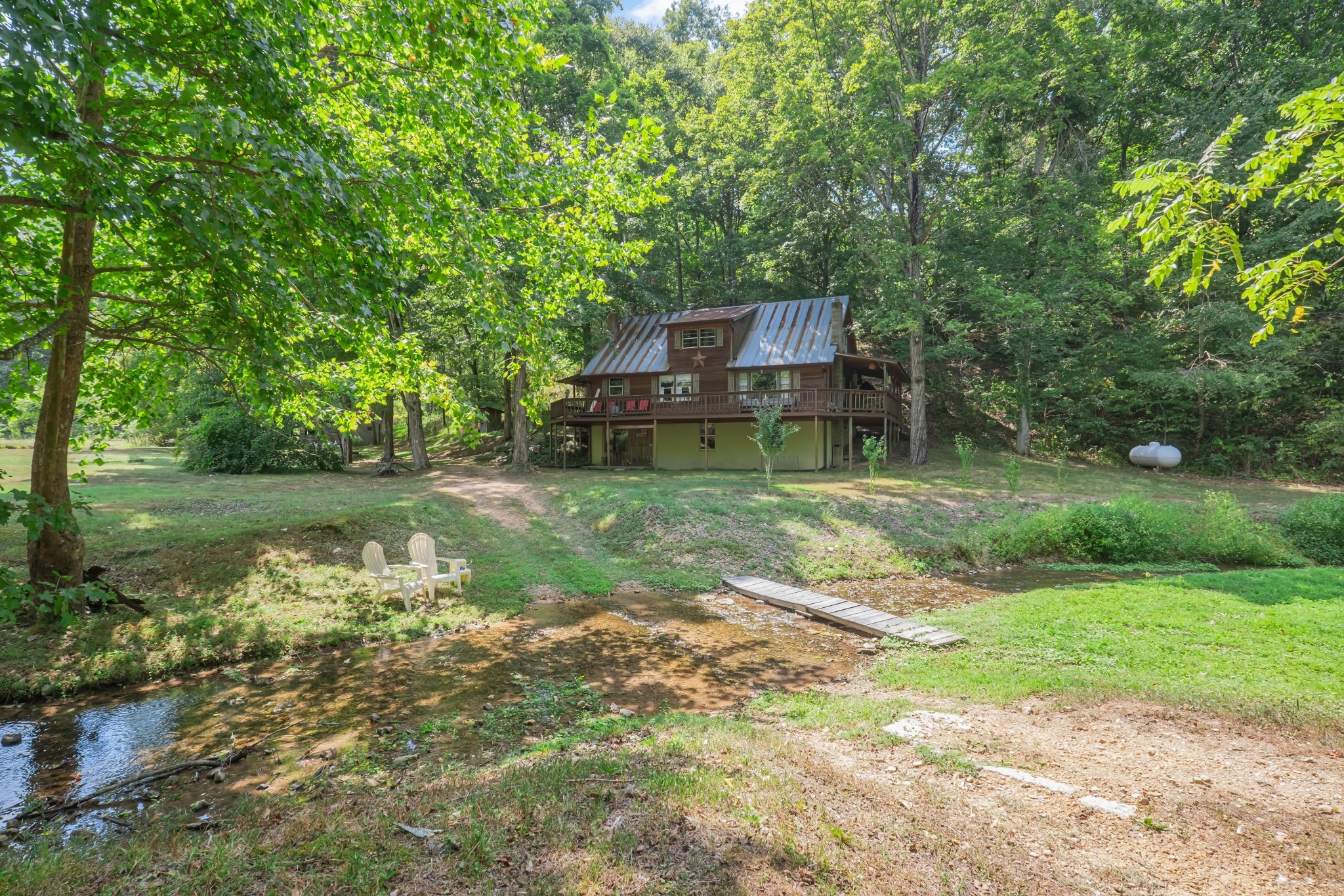 1155 Russell Creek Road Lobelville, TN 37097 - Photo 1 of 49
