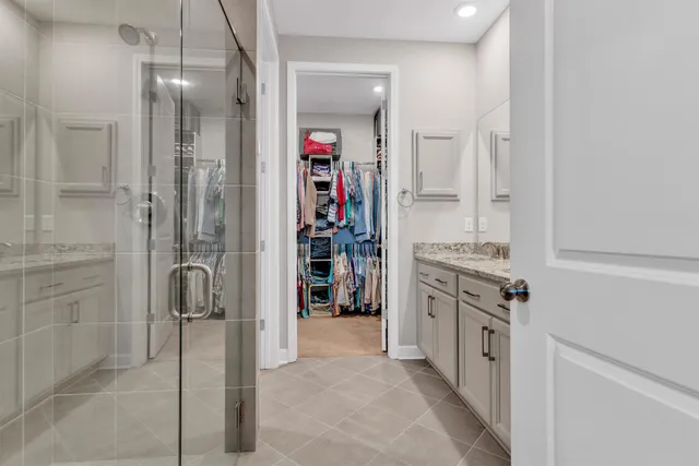 a kitchen with cabinets and a stove