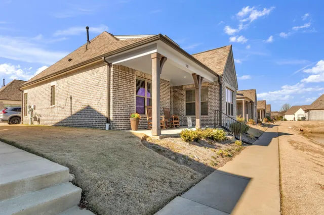 a view of a house with a patio
