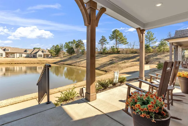 a view of a swimming pool with a lounge chairs