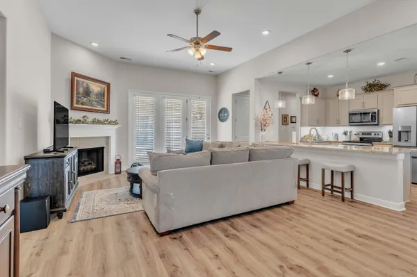 a kitchen with cabinets and a stove