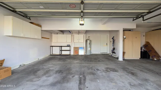 a view of a hallway with seating area