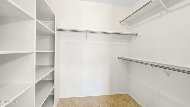 a view of an empty walk in closet