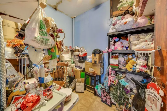 a utility room with lots of baby toys