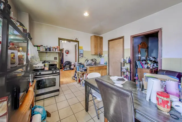 a living room with lots of furniture and a flat screen tv