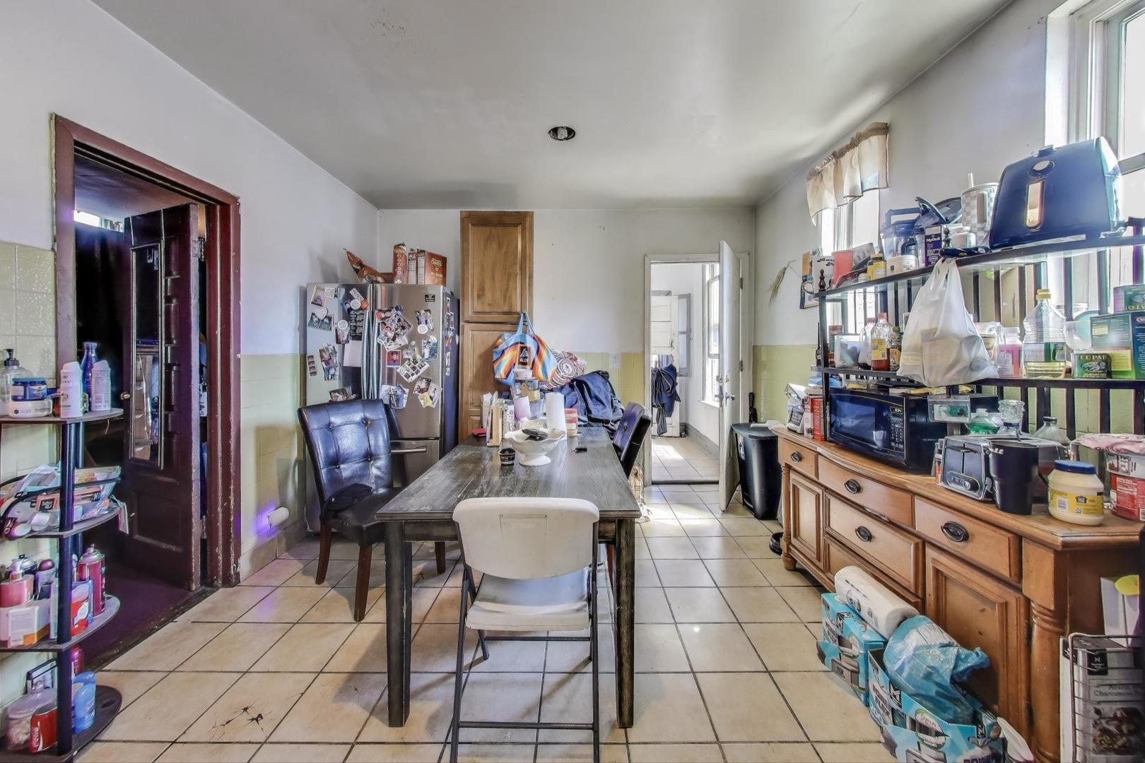 2625 South Central Park Avenue Chicago, IL 60623 - Photo 20 of 36 a view of a dining room with furniture