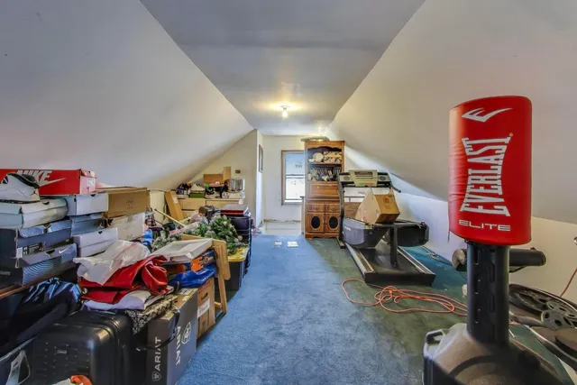 a front view of a house with parking space