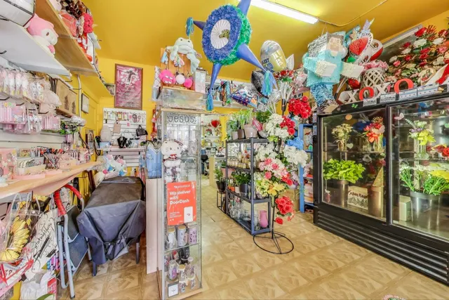 a kitchen with stainless steel appliances granite countertop a sink cabinets and a stove