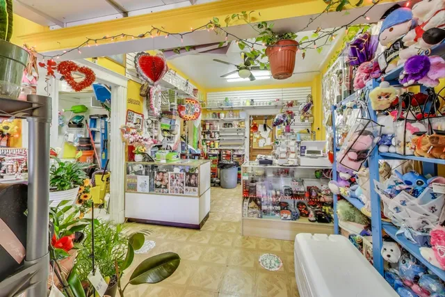 a room filled with furniture and a lamp