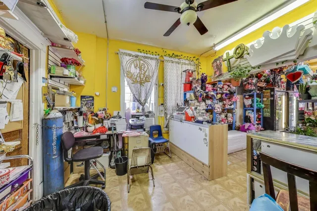 a bed room with a bed and a window