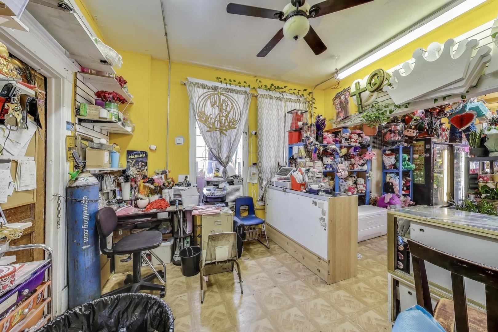 2625 South Central Park Avenue Chicago, IL 60623 - Photo 8 of 36 a view of a chairs in a room