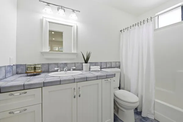 a view of a dinning tables and chairs in patio