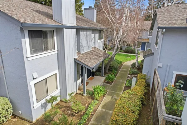 aerial view of a house with a garden
