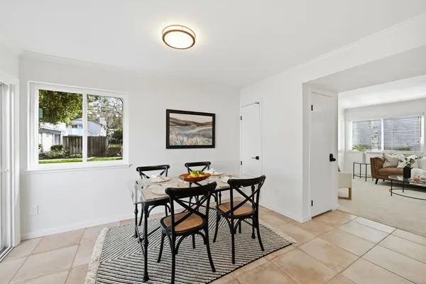 a view of a dining room with furniture