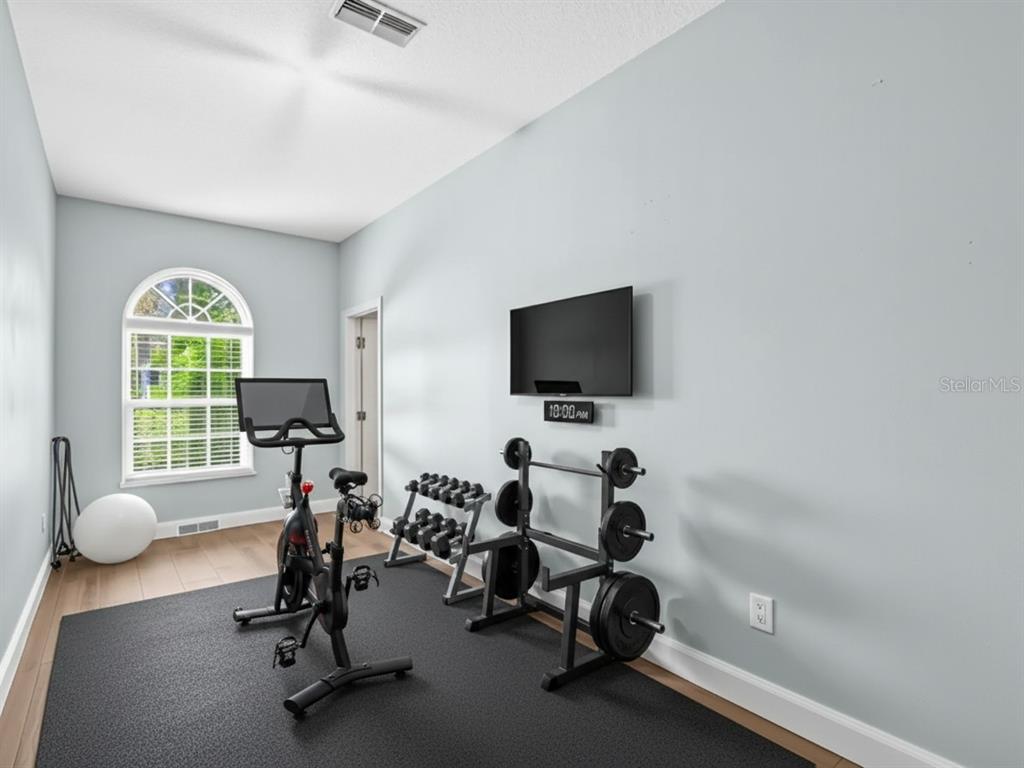640 Kenneth Way Tarpon Springs, FL 34689 - Photo 36 of 84 a view of a livingroom with workspace and a window