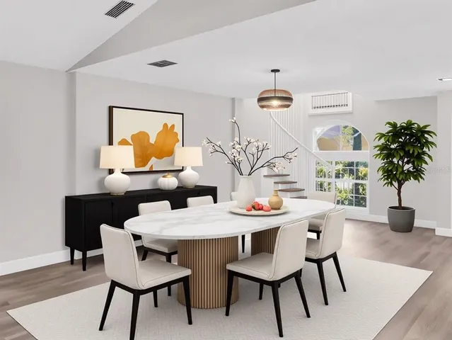 a view of a livingroom with wooden floor